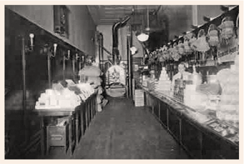 Black and white image of Nicholas Coffee & Tea Co's inside of the store in 1920.